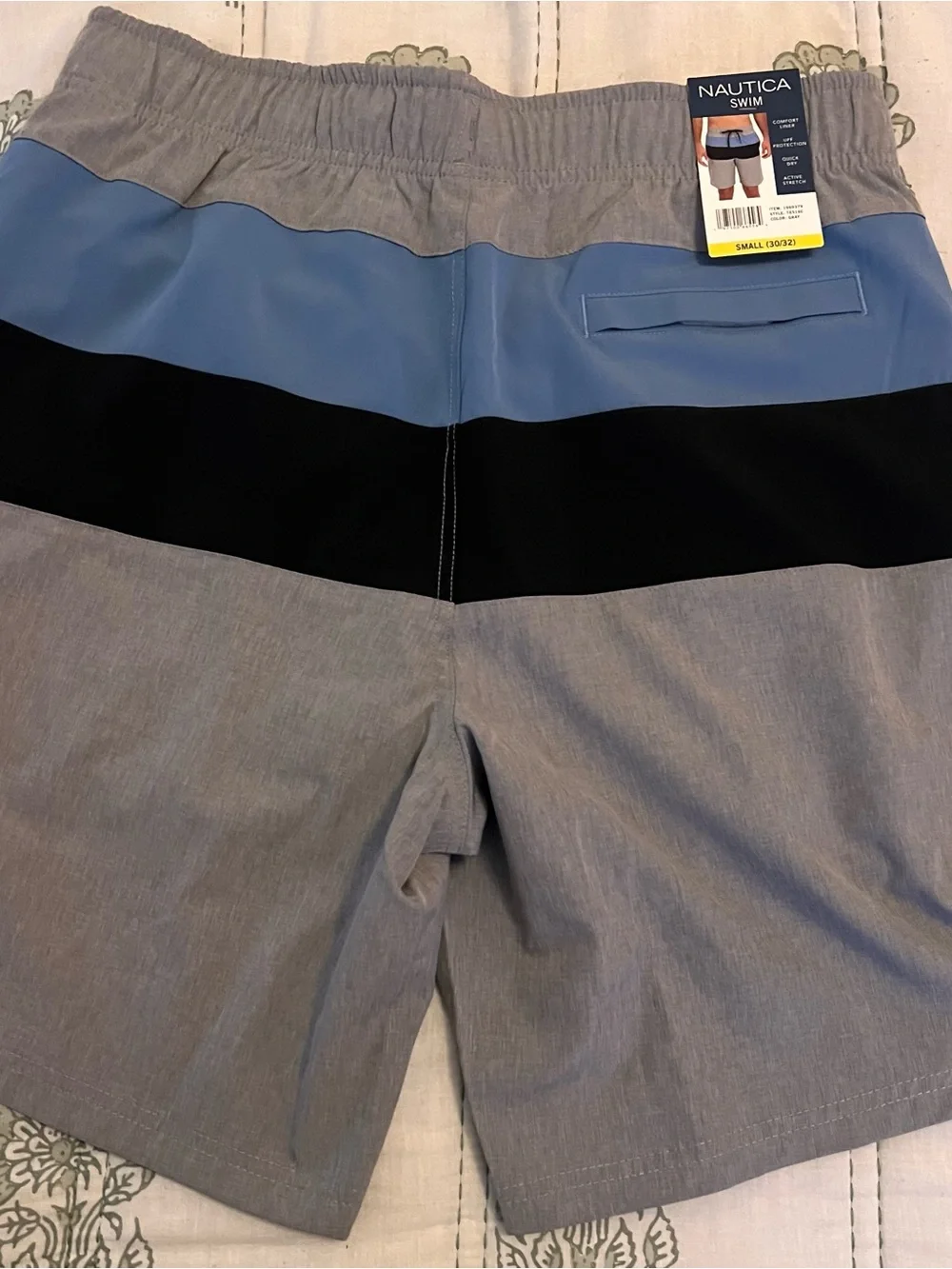 Adilette comfort slides with Nautica swim trunks